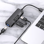 Adattatore hub USB 4 in 1 1xUSB 3.0 e 3xUSB 2.0 nero  JC009-K 6921042138022 F4820