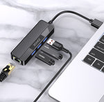 Adattatore hub USB 4 in 1 3xUSB 3.0 e 1xRJ45 Gigabit nero JC009-D 6921042137957 F4815