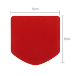 Adesivo decorativo in metallo a forma di scudo 13x8 cm