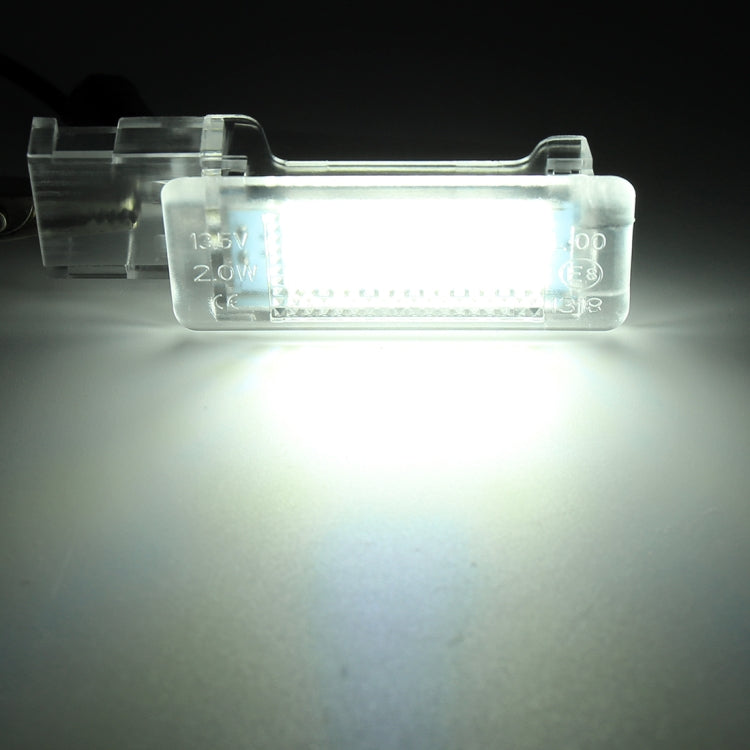 2 PCS DC12V / 1.5W / 6000K / 100LM Luci del nido per auto Lampada vano piedi Lampada sedile 18 LED SMD-3528 Lampade per Volkswagen, Car Foot Nest Lights