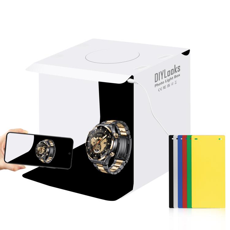 Tenda da studio fotografica pieghevole e portatile da 20 cm con luce da 550 lumen e 6 fondali colorati (nero, bianco, giallo, rosso, verde, blu). Dimensioni da aperta: 24 cm x 23 cm x 23 cm.