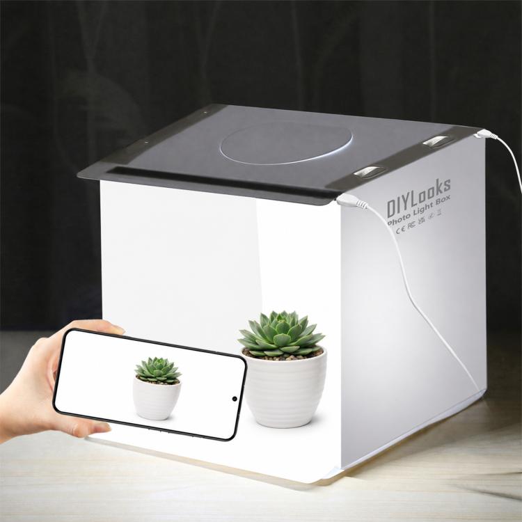 Tenda da studio fotografica pieghevole e portatile da 20 cm con 2 pannelli LED, luminosità 1100LM, kit con 6 sfondi colorati (nero, bianco, giallo, rosso, verde, blu). Dimensioni da aperta: 24 cm x 23 cm x 23 cm.