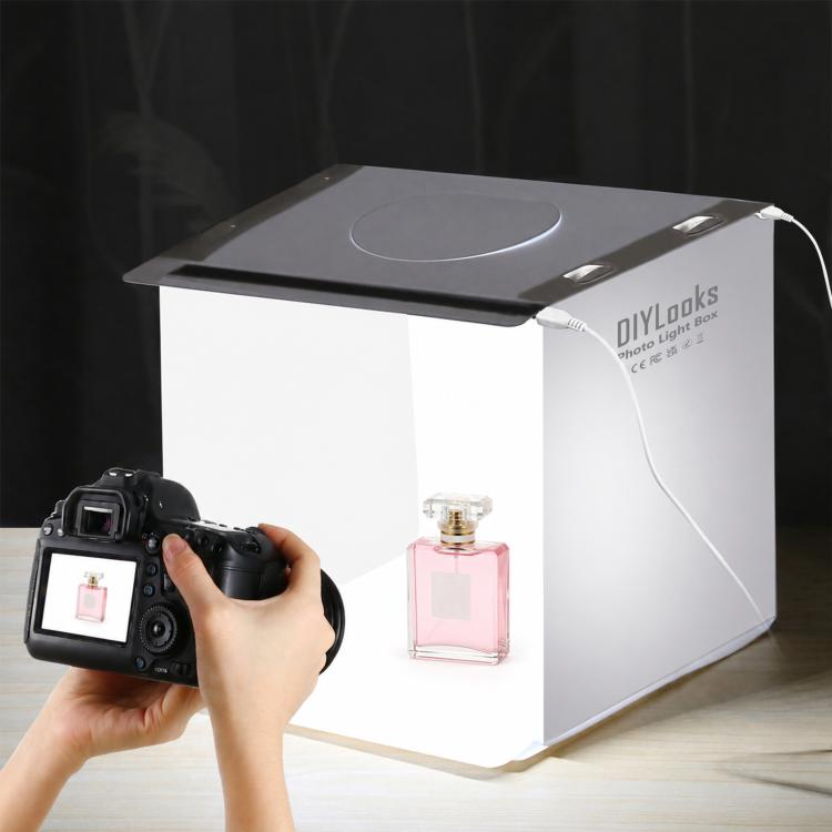 Tenda da studio fotografica pieghevole e portatile da 20 cm con 2 pannelli LED, luminosità 1100LM, kit con 6 sfondi colorati (nero, bianco, giallo, rosso, verde, blu). Dimensioni da aperta: 24 cm x 23 cm x 23 cm.