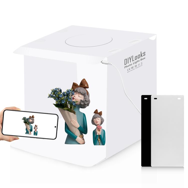 Kit tenda fotografica portatile pieghevole PULUZ da 20 cm con luce da 550 lumen e 2 fondali colorati (nero, bianco). Dimensioni da aperta: 24 cm x 23 cm x 23 cm.