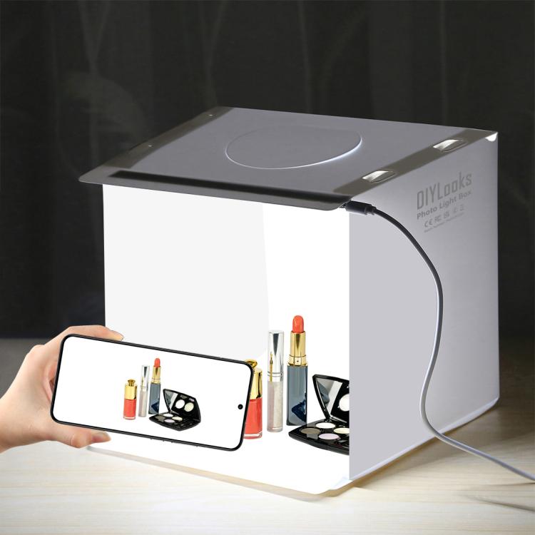 Kit tenda fotografica portatile pieghevole PULUZ da 20 cm con luce da 550 lumen e 2 fondali colorati (nero, bianco). Dimensioni da aperta: 24 cm x 23 cm x 23 cm.