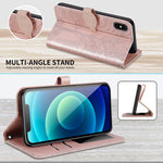 Custodia portafoglio in pelle con motivo a rilievo per iPhone XS