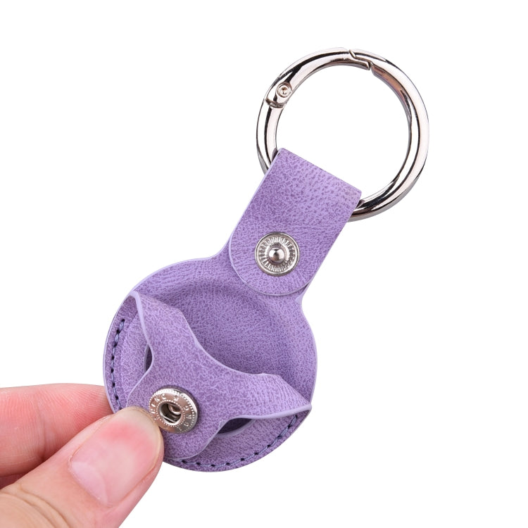 Custodia in pelle goffrata con portachiavi per AirTag