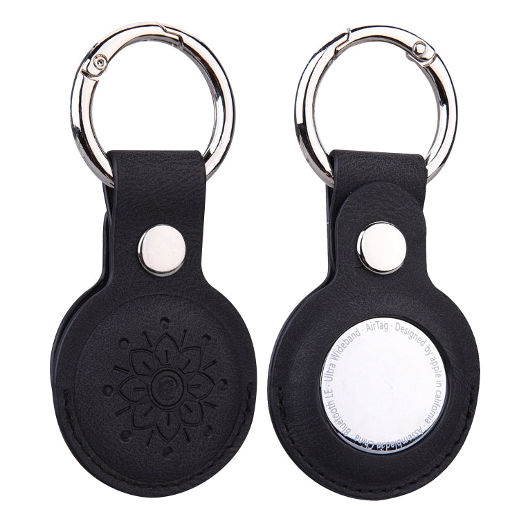 Custodia in pelle goffrata con portachiavi per AirTag
