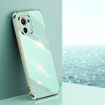 Custodia TPU antiurto con bordo oro per Xiaomi Mi 11