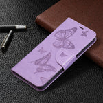 Custodia in pelle PU a vibrazione orizzontale con motivo a due farfalle in rilievo con supporto e slot per schede, portafoglio e cordino, For Samsung Galaxy M32