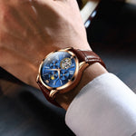 OLEVS 9912 Orologio meccanico luminoso da uomo con quadrante calendario settimanale a volano vuoto