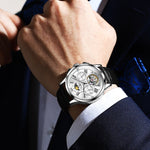 OLEVS 9912 Orologio meccanico luminoso da uomo con quadrante calendario settimanale a volano vuoto