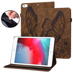 Custodia tablet in pelle con farfalla goffrata per iPad