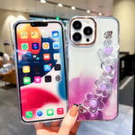 Custodia con motivo marmo dorato e bracciale per iPhone