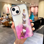 Custodia con motivo marmo dorato e bracciale Love per iPhone 13 e