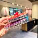 Custodia con motivo marmo dorato e bracciale Love per iPhone