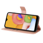 Custodia portafoglio in pelle goffrata con strass per Galaxy A01