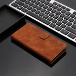 Custodia in pelle goffrata per iPhone 16