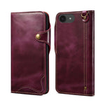 Custodia in vera pelle con bottone magnetico per iPhone
