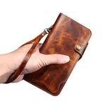 Custodia in vera pelle con bottone magnetico per iPhone