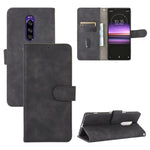 Tinta unita Skin Feel Fibbia magnetica Flip orizzontale Custodia in pelle PU con struttura in vitello con supporto e slot per schede e portafoglio, For Sony Xperia 1 II, For Sony Xperia 1, For Sony Xperia 5, For Sony Xperia 8