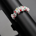 Cinturino per orologio xDfind in poliestere elastico a forma di ghirlanda per Fitbit Luxe, S, L
