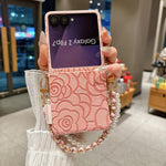 Custodia per telefono con cinturino e fibbia laterale, decorata con camelia in rilievo., For Samsung Galaxy Z Flip7 5G