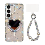 Custodia magnetica per telefono con ciondolo a forma di cuore scintillante IMD e cinturino, For Samsung Galaxy S26+ 5G, For Samsung Galaxy S26 Ultra 5G, For Samsung Galaxy S26 5G, For Samsung Galaxy S25 5G