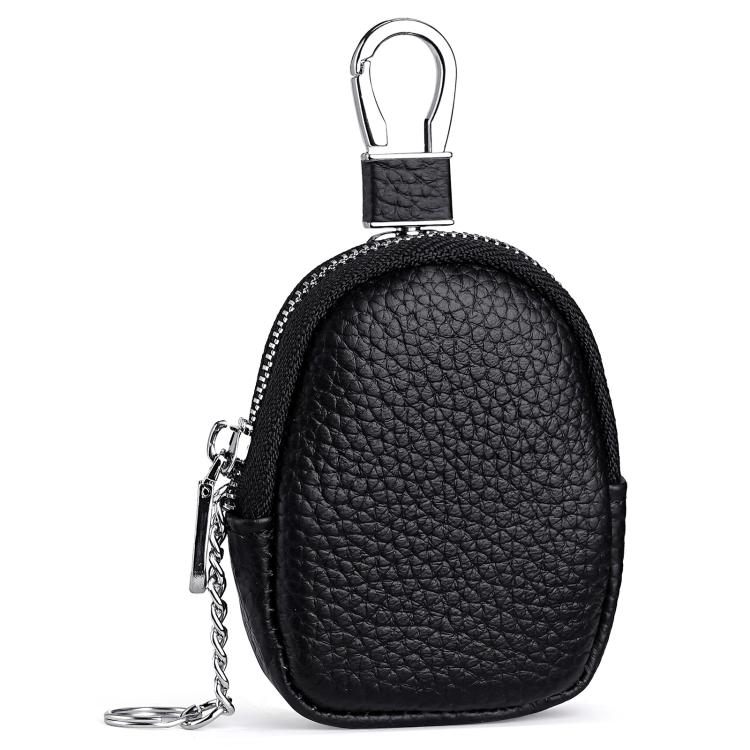 Mini custodia in vera pelle per auricolari, cavo dati e monete.