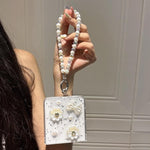 Custodia per telefono con cinturino e design a nodo di farfalla con fiore di perla., For Samsung Galaxy Z Fold7 5G, For Samsung Galaxy Z Flip7 5G, For Samsung Galaxy Z Flip6/5, For Samsung Galaxy Z Fold6, For Samsung Galaxy Z Fold5                     ...