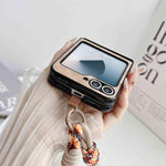 Custodia per telefono antiurto con chiusura magnetica a doppio asse in ecopelle vegana e cinturino da polso., For Galaxy Z Flip6 / 7 FE, For Galaxy Z Flip7 5G, For Galaxy Z Flip5