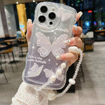 Custodia per telefono in TPU con farfalla glitterata ondulata e catena a bracciale, For iPhone 16 Pro Max, For iPhone 16 Pro, For iPhone 16 Plus, For iPhone 16, For iPhone 15 Pro Max, For iPhone 15 Pro, For iPhone 15 Plus, For iPhone 15                ...