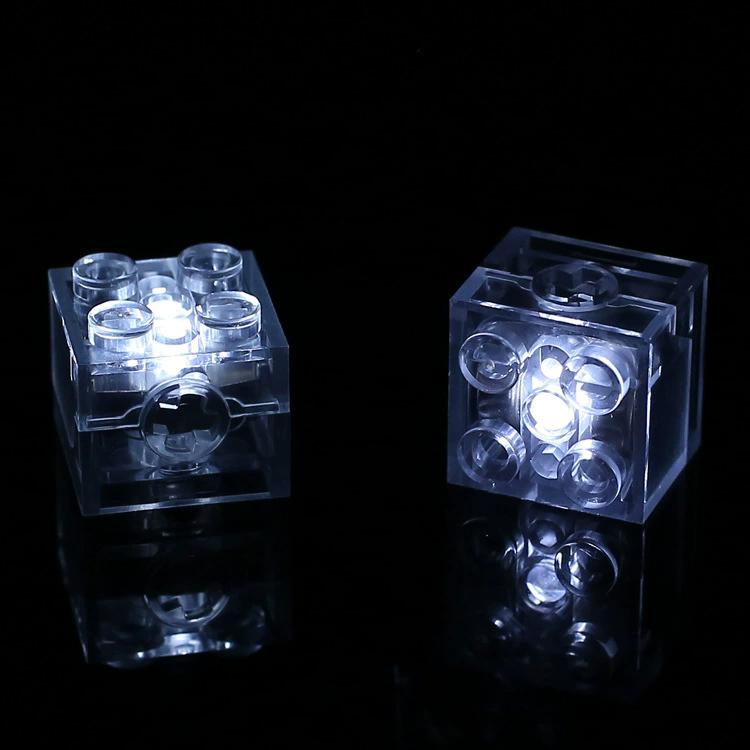 Blocchi da costruzione fai-da-te 2x2 con luce LED, giocattolo luminoso