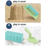 Giocattoli da spiaggia per bambini: pala, muri di mattoni, stampi.