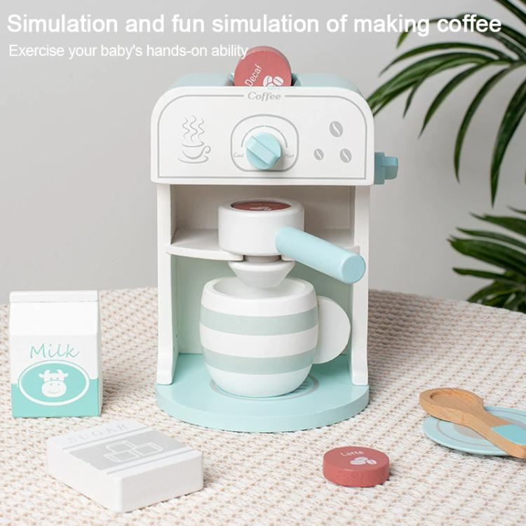 Macchina da caffè giocattolo in legno per bambini.