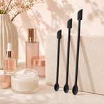 Set di 3 mini spatole raschianti in silicone a doppia testa per flaconi cosmetici.