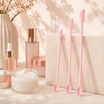 Set di 3 mini spatole raschianti in silicone a doppia testa per flaconi cosmetici.