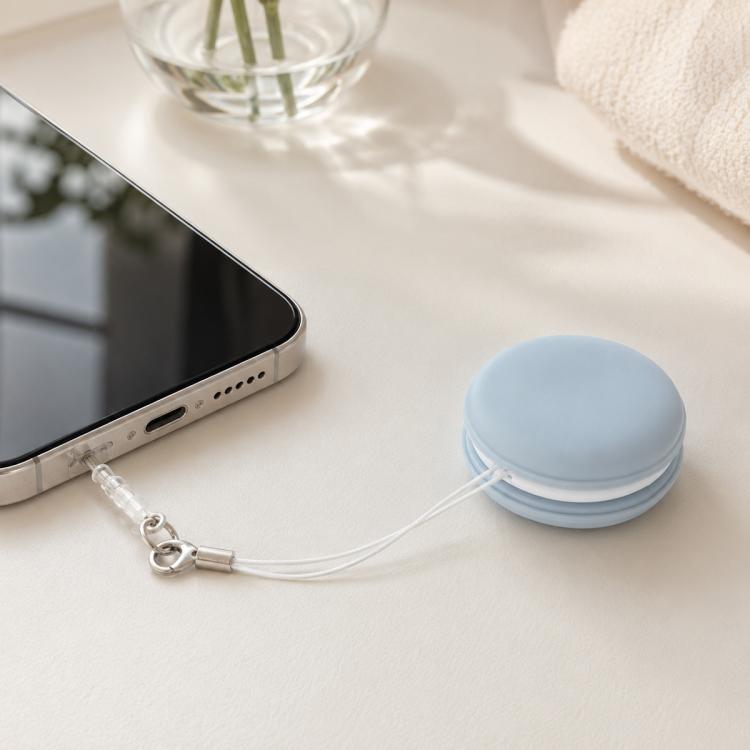 Panno multifunzionale portatile a forma di macaron per la pulizia dello schermo del telefono, con cordino.