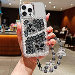 Custodia per telefono in acrilico con perle, doppia farfalla e strass, realizzata a mano, con catenina da polso., For iPhone 17 Pro Max, For iPhone 17 Pro, For iPhone 17, For iPhone 16 Pro Max