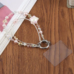 Collana per cellulare con ciondolo a forma di stella a cinque punte, dipinta ad olio, con laccetto di sicurezza.