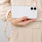 Ciondolo portafortuna con perline e laccetto di sicurezza per cellulare, per donne e ragazze.