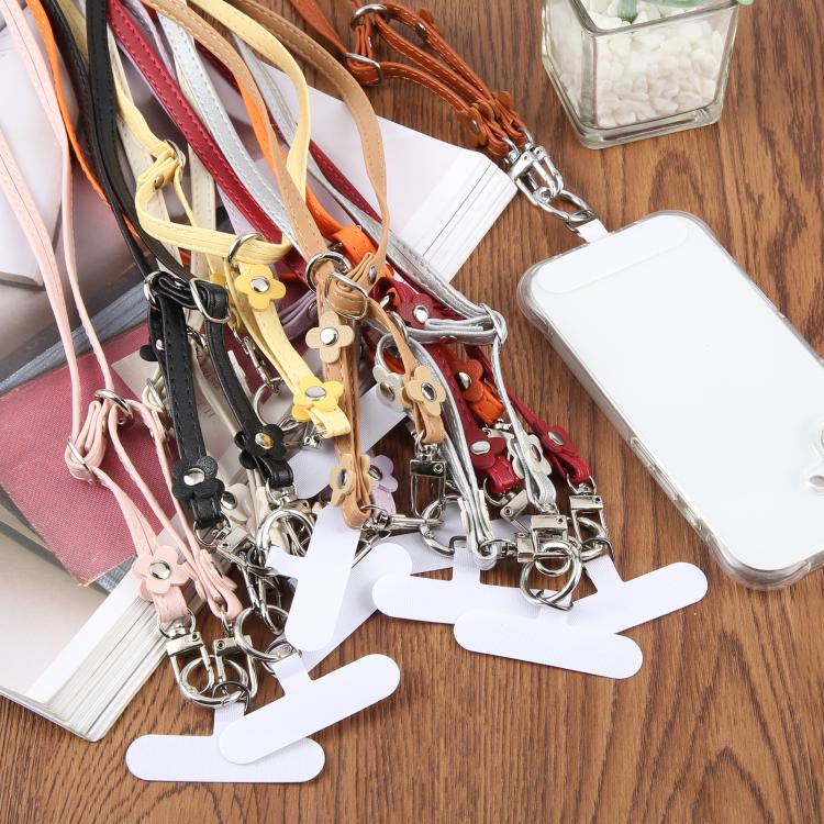 Cordino per cellulare unisex con cinturino regolabile in pelle e decorazione floreale, dotato di laccetto di sicurezza.