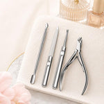 Set di 4 pezzi per manicure: tronchesino per cuticole, taglia cuticole, spingi cuticole, lima per unghie in acciaio inossidabile.