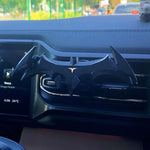 Supporto per telefono da auto a gravità, a forma di pipistrello, da fissare alla bocchetta dell'aria.