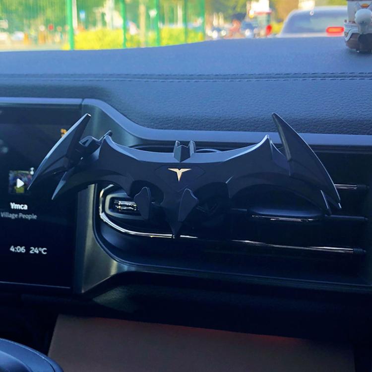 Supporto per telefono da auto a gravità, a forma di pipistrello, da fissare alla bocchetta dell'aria.