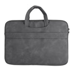 Borsa a mano in pelle di pecora per riporre il laptop.