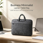 Borsa a mano in pelle di pecora per riporre il laptop.