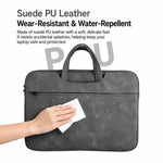 Borsa a mano in pelle di pecora per riporre il laptop.