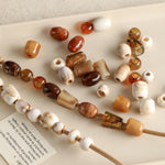 20 pezzi/confezione Perline acriliche a foro largo Accessori fai da te, Milk Coffee 12 x 10 mm, Caramel 12 x 10 mm, Earthy Brown 12 x 10 mm, Large Milk Coffee 15 x 13 mm, Milk Coffee 12 x 13 mm, Small Milk Coffee 10 x 8 mm, Milk Coffee 13 x 17 mm      ...