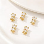 Confezione da 5 perline distanziatrici con foro e zirconi incastonati, placcate in oro, per la creazione di gioielli fai da te., Dual-Hole Snowflake Bead, Snowflake Bow Diamond Bead, Hexagonal Zircon Bead 8mm, 2-row Diamond Pig Nose Oval               ...
